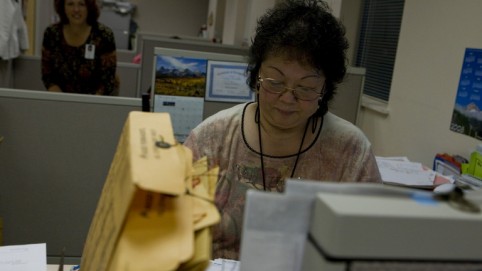 Woman working with documents.